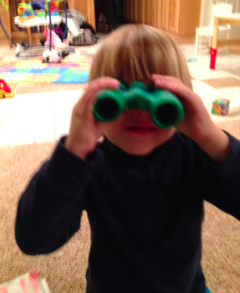 My son, Michael, and his binoculars he got for Christmas.